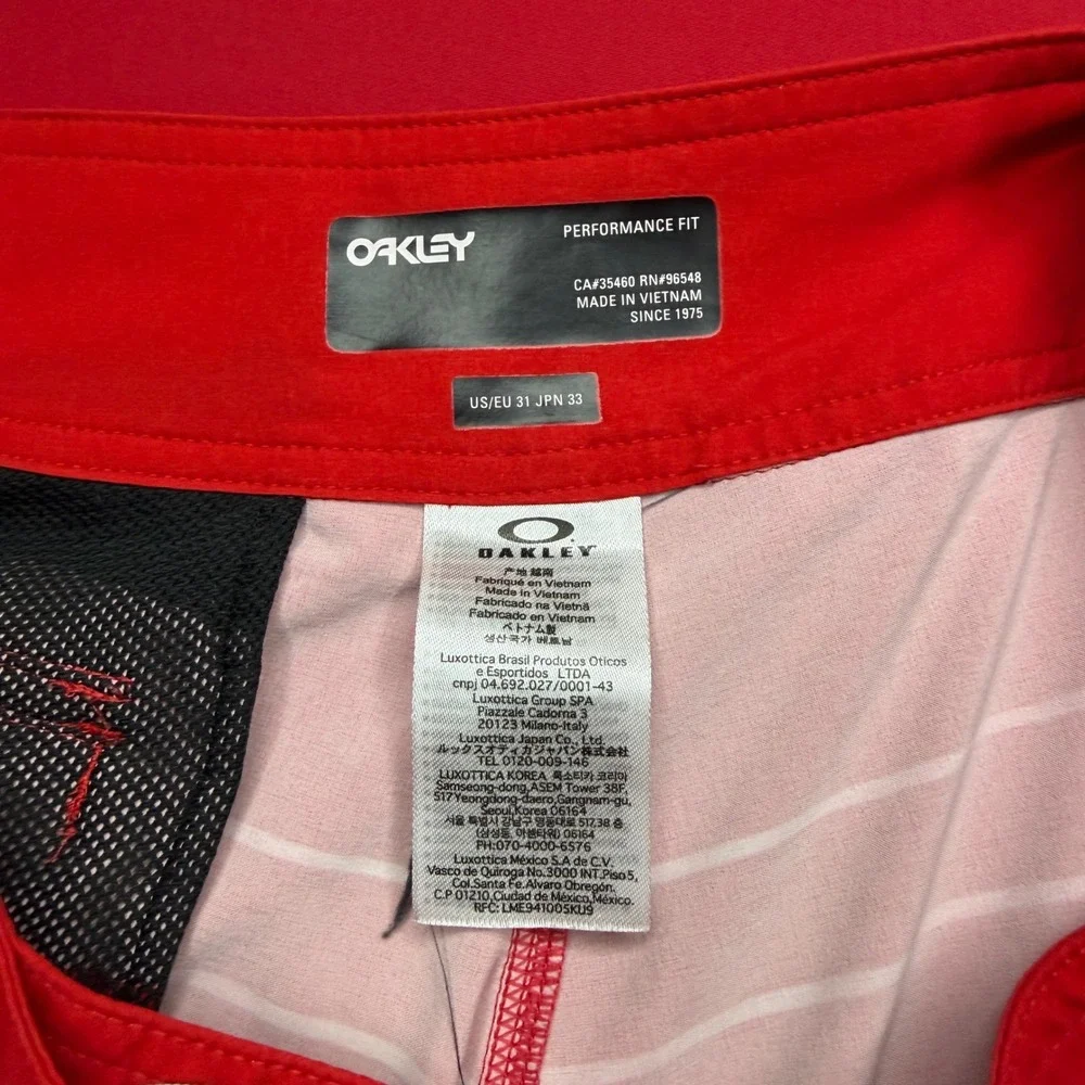 SURF Oakley Mens Board Shorts Red Striped Tropical Floral Swim Trunks Size 31